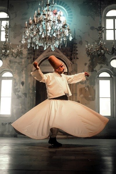 a-whiling-dervish-sufi-mevlana-ceramony